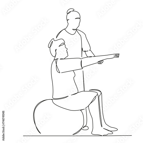 Osteopath giving physical therapy to woman on ball