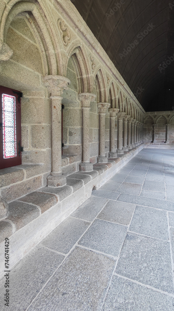 Beautiful windows and columns in the cloister of the Mont Saint Michel church in France