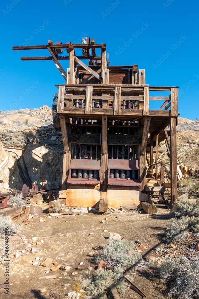 Lost Horse Gold and Silver Mine Platform Vertical Portrait. Rust Colored Industrial Machine Equipment Ghost Town, Joshua Tree National Park California USA Lost Horse Gold and Silver Mine Platform Vertical Portrait. Rust Colored Industrial Machine Equipment Ghost Town, Joshua Tree National Park California USA