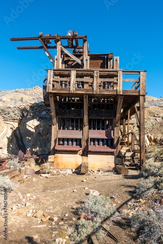 Lost Horse Gold and Silver Mine Platform Vertical Portrait. Rust Colored Industrial Machine Equipment Ghost Town, Joshua Tree National Park California USA