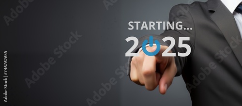 Businessman on blurred background using new year concept on virtual screen