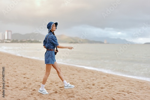 Active Women's Beach Workout: Young, Beautiful Jogger Embracing Fitness and Freedom at Sunset