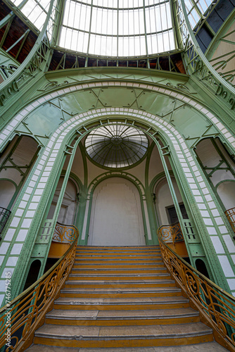 staircase of a huge palace and gallery with glass dome and roof