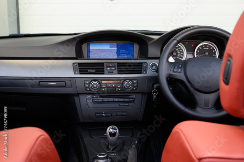 Car interior with climate and multimedia controls