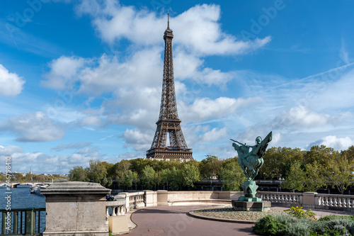 Eiffel tower with Statue of La France Renaissante, Paris, France