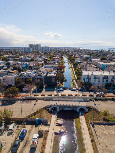 Aerial drone view over Venice Canals Historic District looking south down the Grand Canal.
