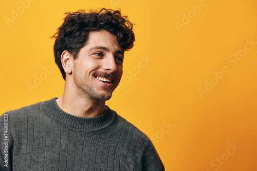 Head man portrait modern fashion sweater background student orange happy trendy young smile