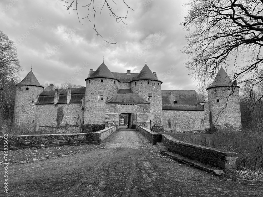 The Castle of Corroy-le-Chateau (French: Château de Corroy-le-Château) is a medieval castle in the village of Corroy-le-Château, in the province of Namur, Wallonia, Belgium. Black and white photo The Castle of Corroy-le-Chateau (French: Château de Corroy-le-Château) is a medieval castle in the village of Corroy-le-Château, in the province of Namur, Wallonia, Belgium. Black and white photo