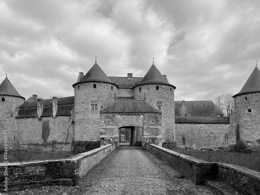 The Castle of Corroy-le-Chateau (French: Château de Corroy-le-Château) is a medieval castle in the village of Corroy-le-Château, in the province of Namur, Wallonia, Belgium. Black and white photo The Castle of Corroy-le-Chateau (French: Château de Corroy-le-Château) is a medieval castle in the village of Corroy-le-Château, in the province of Namur, Wallonia, Belgium. Black and white photo