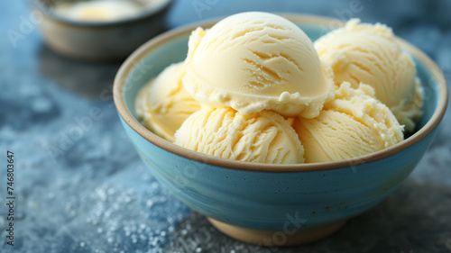 Blue bowl of vanilla ice cream