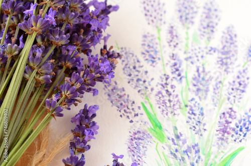 macro image of lavender flowers and paint sketch nearby