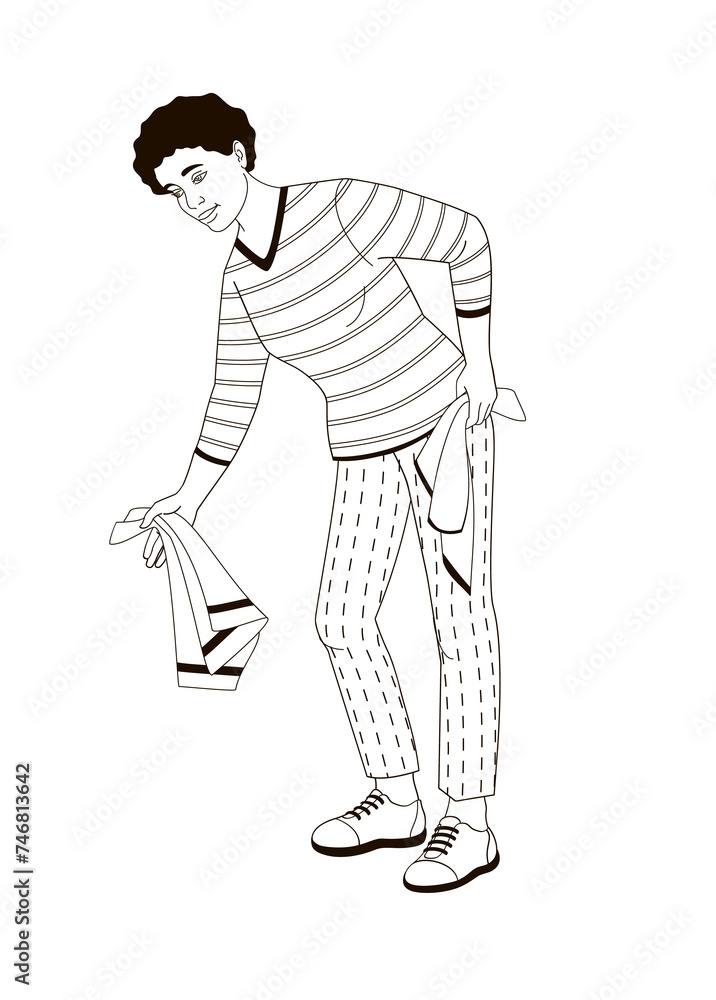Fototapeta premium African American woman bent over to put laundry in the washing machine