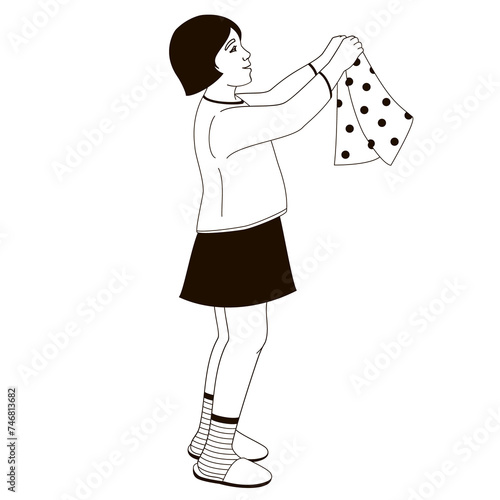 girl holding clean clothes in her hands