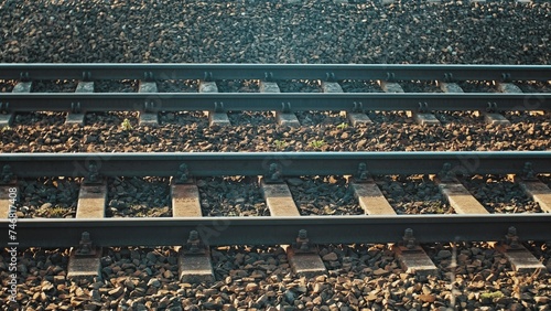 Railway Tracks on Pebble Rock Ballast Trackbed and Railway Sleepers