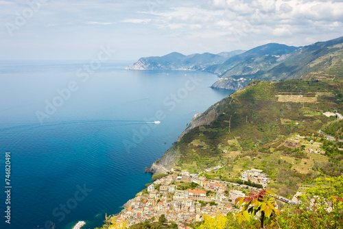 View of Riomaggiore town from above with the Ligurian Sea, Cinque Terre, Italy