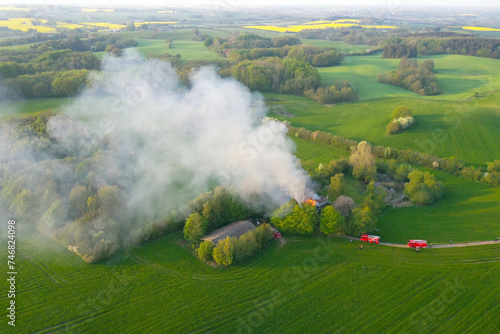 Aerial view of house on fire in Denmark 