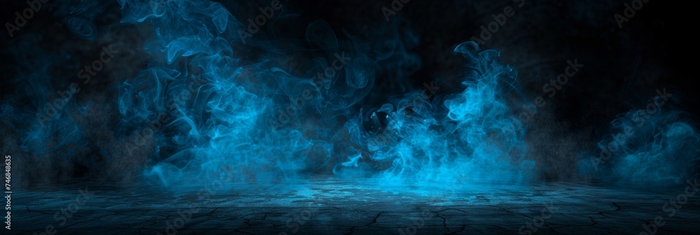 Obraz premium Enchanting blue smoke effect forms captivating background for various design projects and concepts.