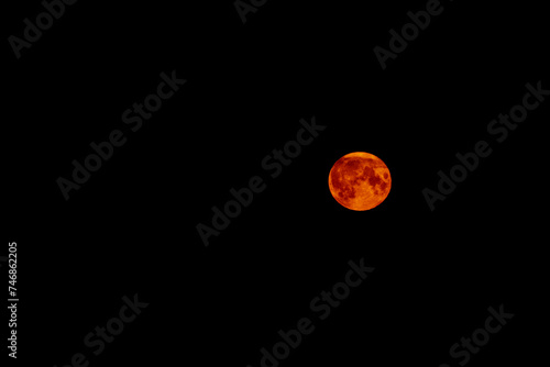 red moon on black