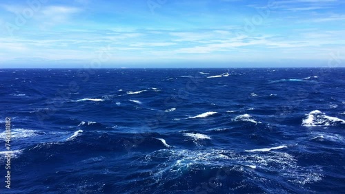 Deep blue ocean during the day with rough seas