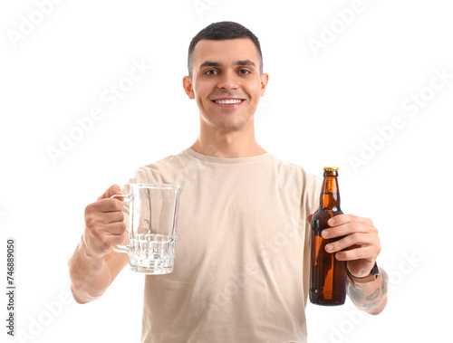 Young male bartender with m...