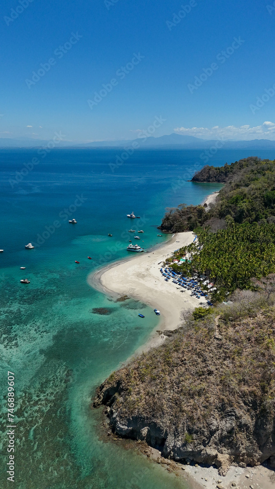 Drone aerial view of Isla Tortuga, tropical paradise beach island in Costa Rica central america Nicoya peninsula
