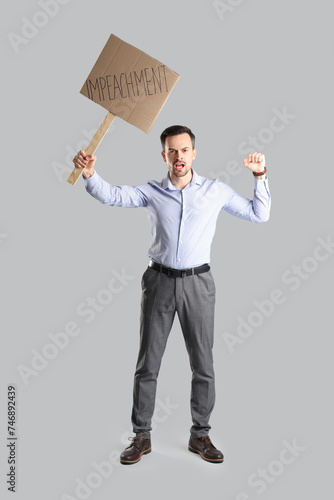 Protesting businessman hold...