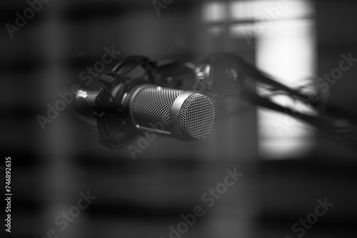 condenser microphone on a boom arm for podcasting