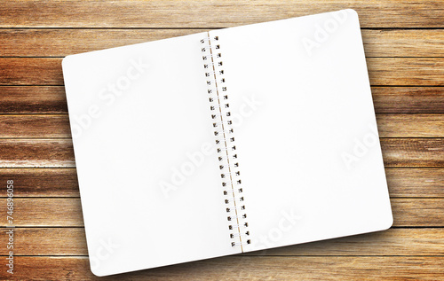 Top view blank paper notepad on wood table background