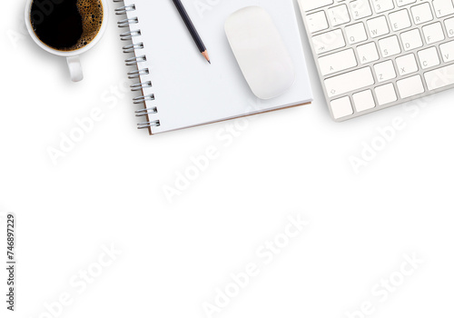 keyboard and coffee on desktop in office