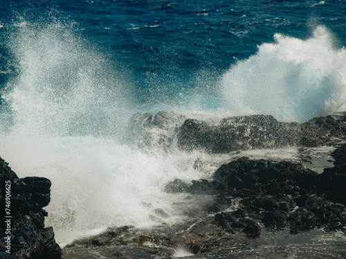 waves breaking on the rocks