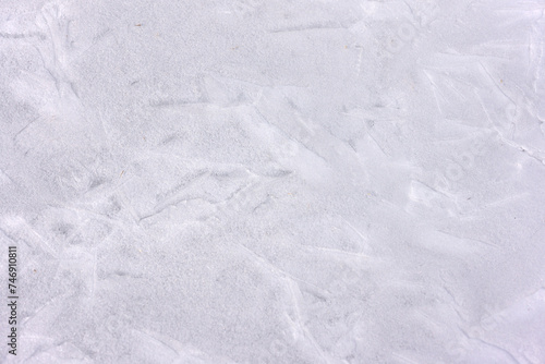 Frozen surface texture background in winter