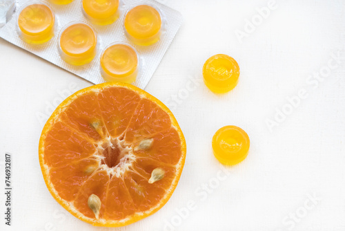 cough sore throat pastille extract orange fruits arrangement flat lay style on background white
