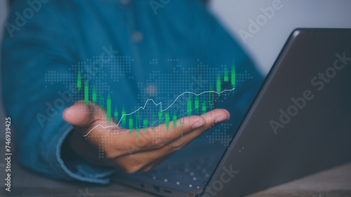 Businessman using laptop trading forex stock market. Business financial data.