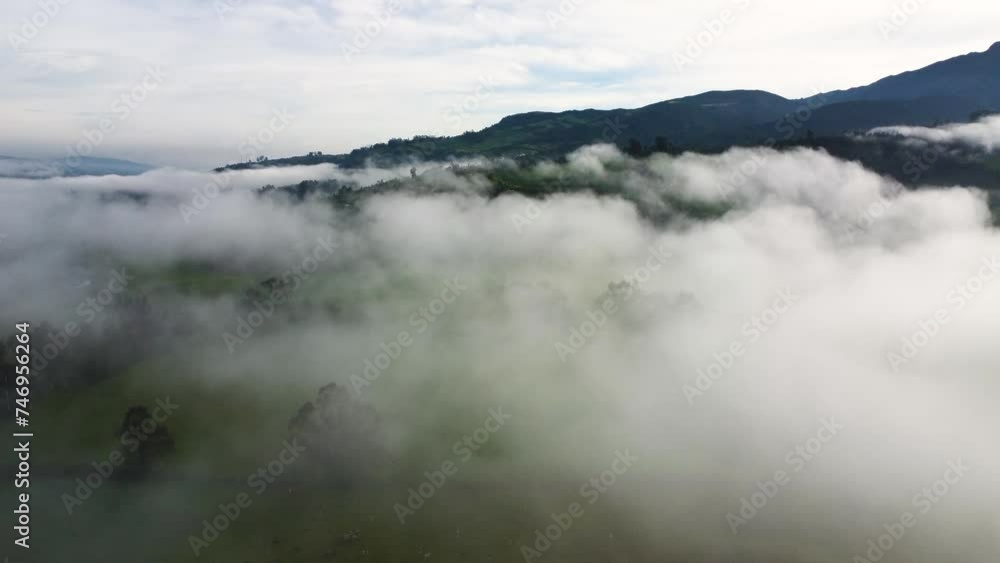 Cinematic aerial drone clip over the misty mountaintop and clouds of the Neblina area in Machachi, Equador Cinematic aerial drone clip over the misty mountaintop and clouds of the Neblina area in Machachi, Equador
