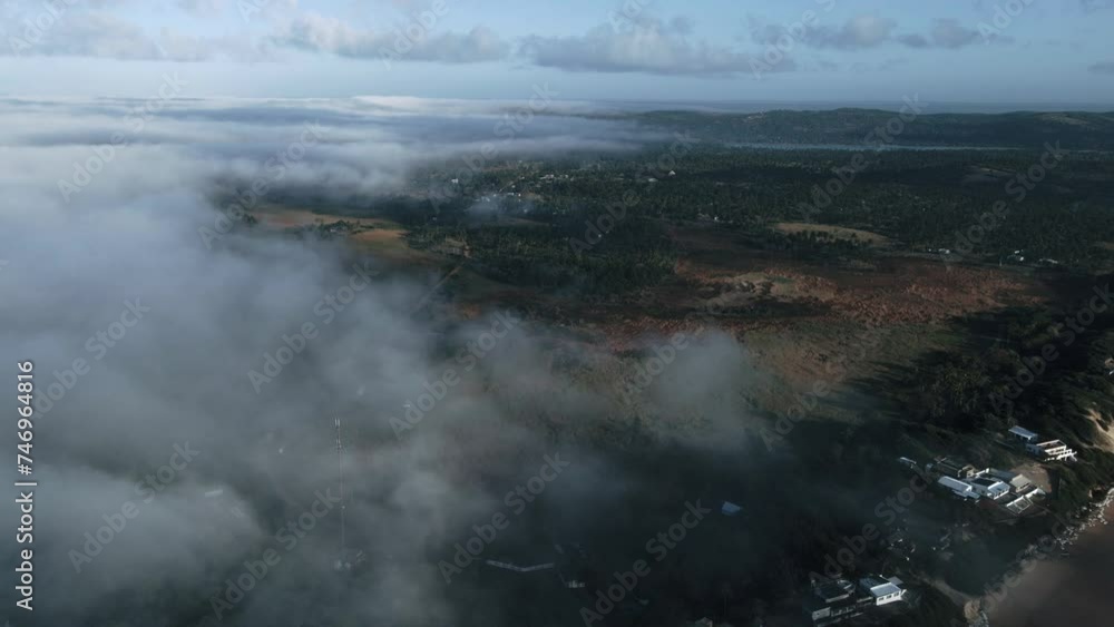 Aerial shot overhead low lying clouds in the Mozambique countryside Aerial shot overhead low lying clouds in the Mozambique countryside