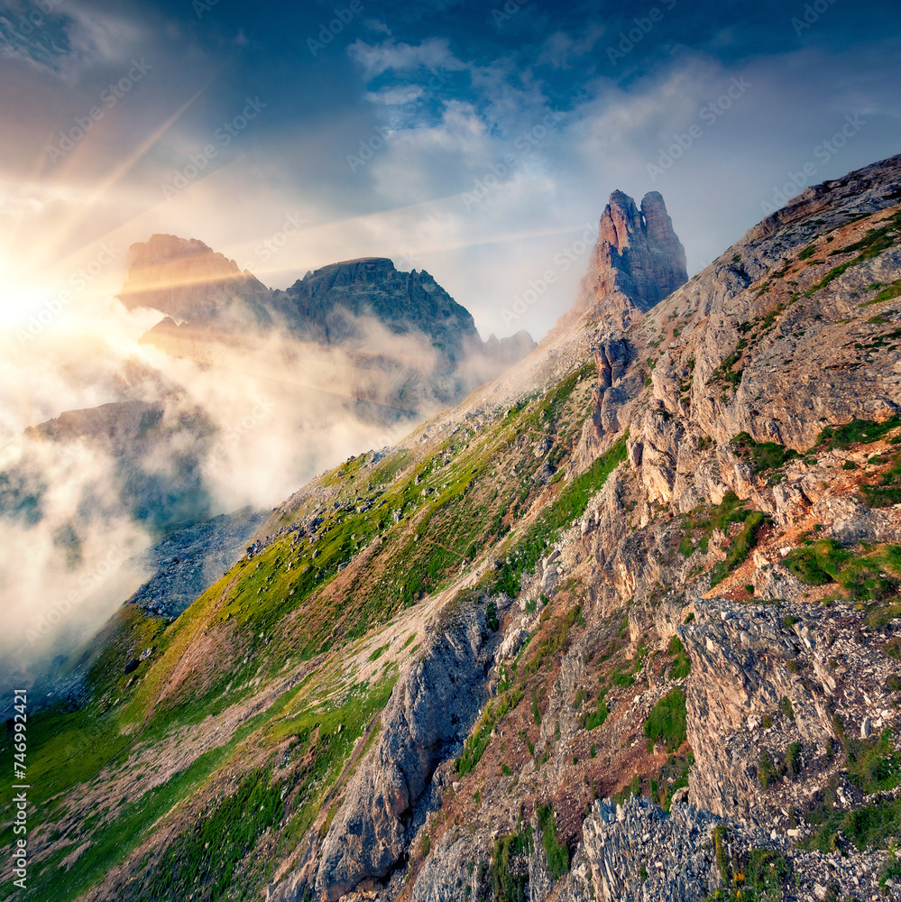 Obraz premium Wonderful autumn view of huge cliffs in Tre Cime di Lavaredo National Park, Italy, Europe. Impressive morning scene of Dolomite Alps. Beauty of nature concept background.