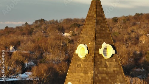 The Historic Washington County Courthouse Tower's Steeple At Sunset In Fayetteville, Arkansas, USA. Tilt-Down Shot photo