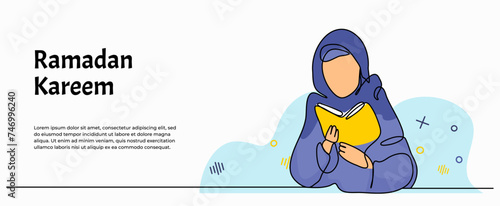 a young girl read the Quran earnestly
