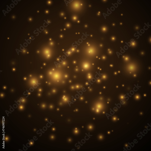 Sparkling magical gold yellow dust particles. Bokeh effect. Texture glitter and elegant for Christmas. Magic golden concept. Abstract black background.