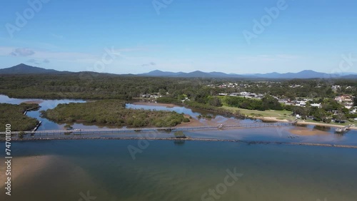 Urunga boardwalk aerial views inland past Urunga town and up the river valleys to the Great Dividing Range photo