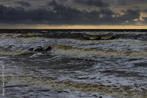 Strong storm and stormy sky on the shores of the Barents Sea. Varandey, Arctic, Russia.