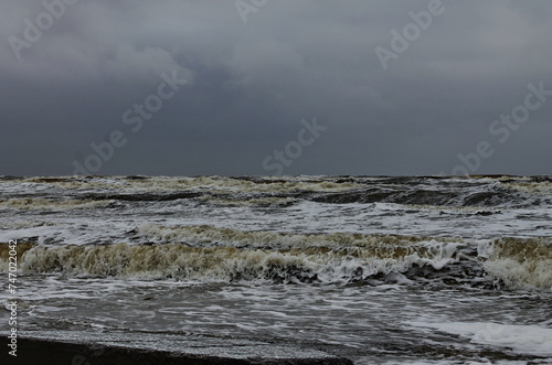Strong storm and stormy sky on the shores of the Barents Sea. Varandey, Arctic, Russia.