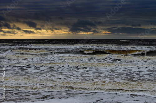 Strong storm and stormy sky on the shores of the Barents Sea. Varandey, Arctic, Russia.