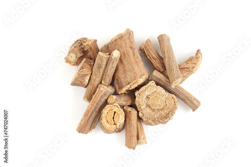 A pile of Dry Organic Vridha Daru (Argyreia speciosa) barks, isolated on a white background. Top view