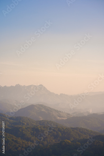 Fototapeta Naklejka Na Ścianę i Meble -  landscape and travel concept with sunset and twilight sky with layer of mountain