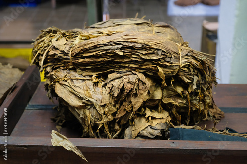 A bunch of fermented tobacco leaves photo