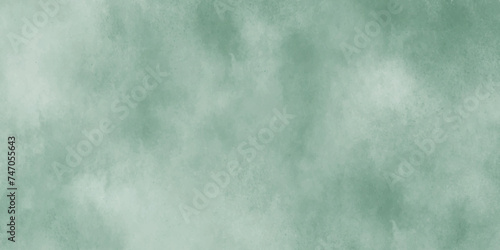 Abstract painted green color background on paper texture. Old paper background. Vintage rustic faded paper texture. Gurage paper texture design and Vector design in illustration. photo
