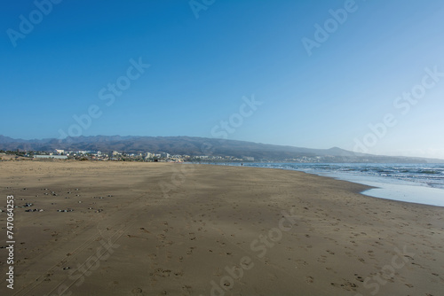 Sandy beach of Maspalomas with a view of the city on Gran Canaria, Spain