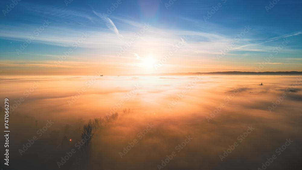 Field covered by fog at sunset, top view. Field covered by fog at sunset, top view.