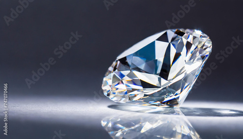 A diamond is displayed on a pure white surface  copyspace on a side
